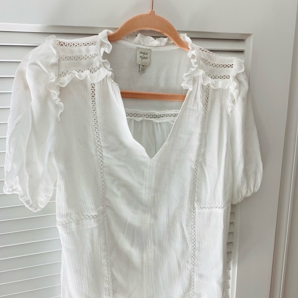 Roan & Ryan slight ruffle blouse.